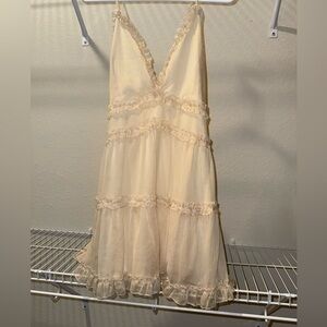 Cream Ruffled Sleeveless Dress